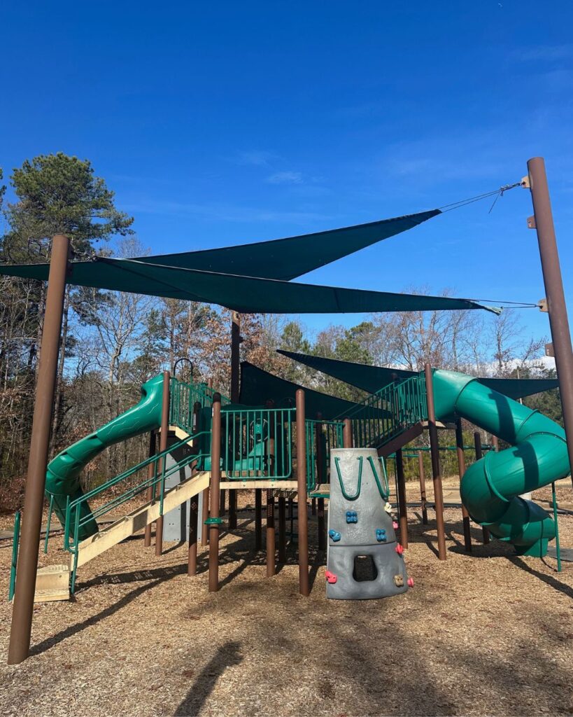 Shaded playground structure at Col. Francis Beatty Park