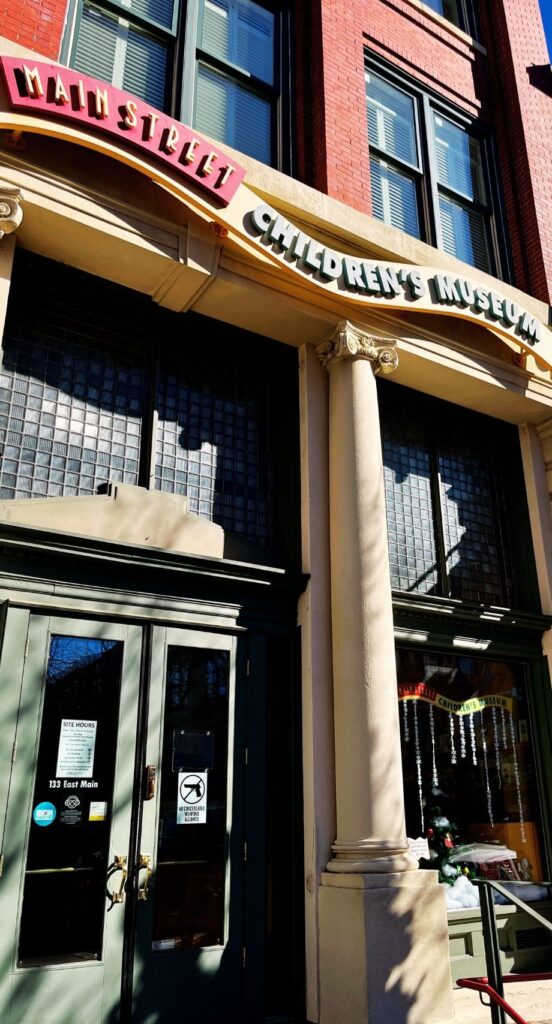 Main Street Children's Museum in Rock Hill has a large entrance with glass windows and whimsical signage on Main Street in downtown Rock Hill.