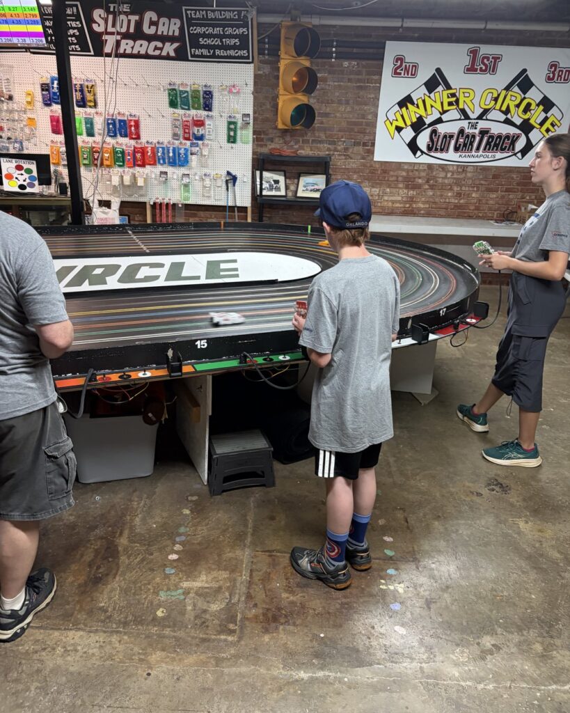 Kids racing slot cars at The Slot Car Track in Kannapolis, NC